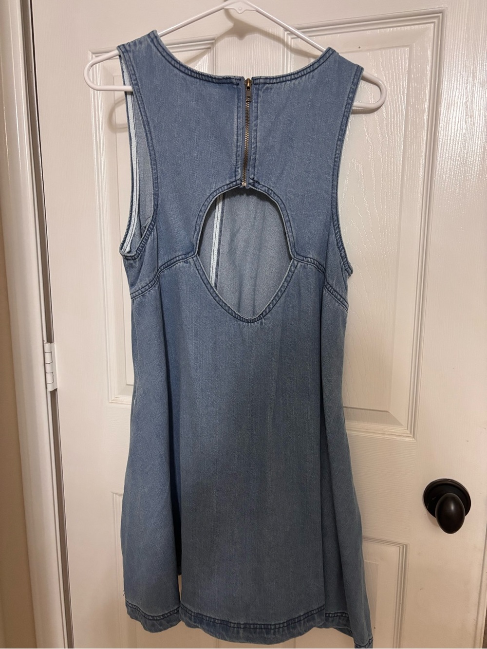 Sleeveless Light Wash Denim Dress with Back Cutout and side pockets